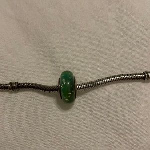 Green glass pandora charm with gold leaf